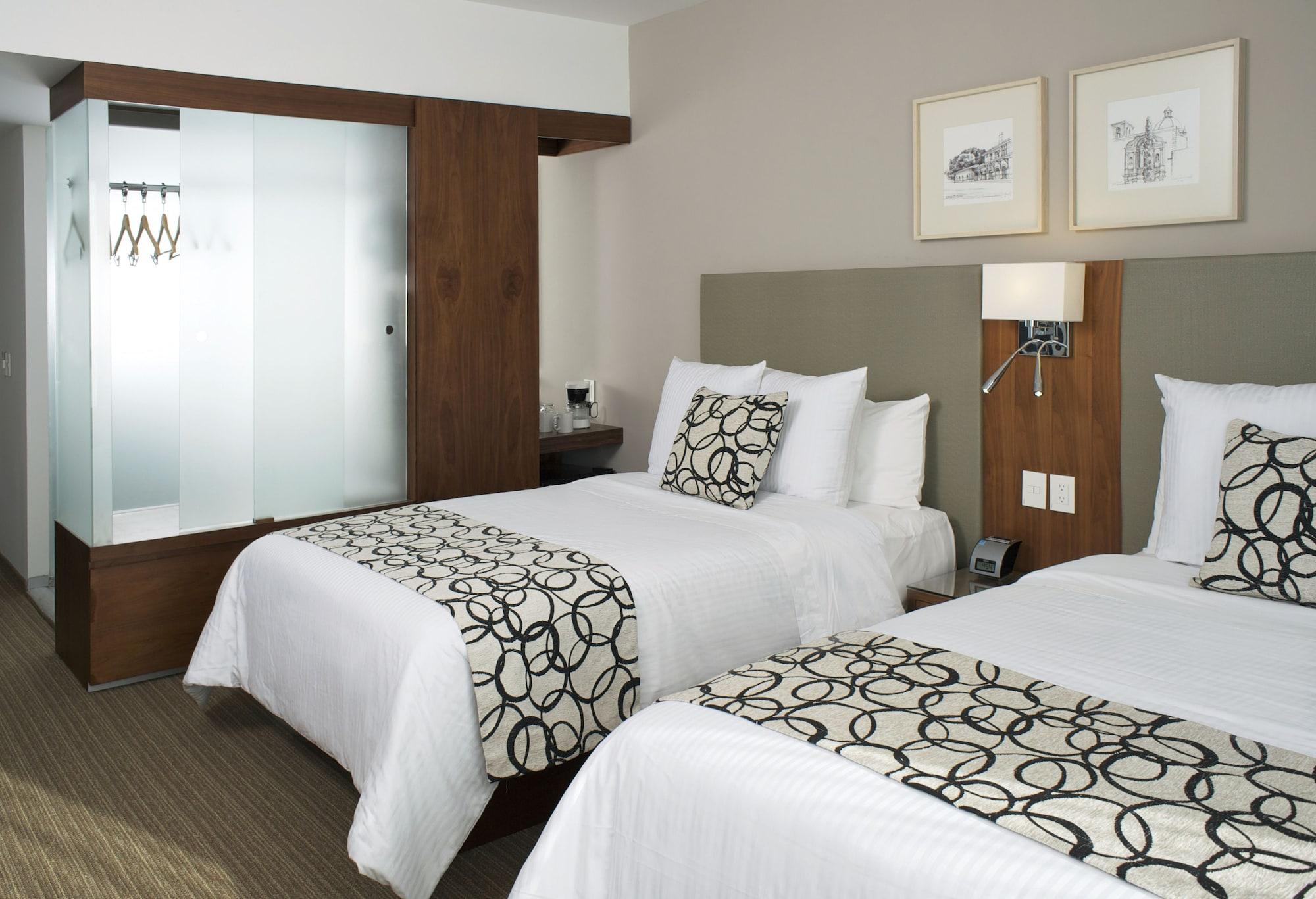 Casa Inn Premium Hotel Queretaro Miranda Exterior foto A typical room at the Westin
